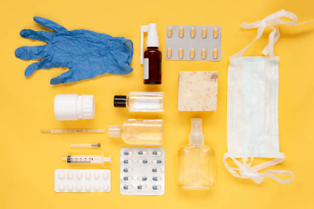 istock Medical supplies on yellow background 1223816295