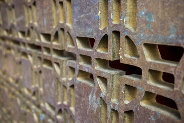 istock Background of a rusty metallic grate in bronze, with green spots. 1223818337