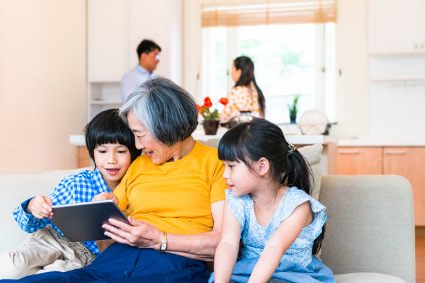 istock Grandma helping with the homework 1223824025