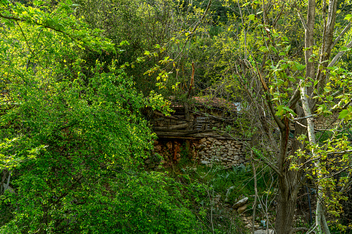 the old mill named Sinan degirmeni and old wooden grain houses near the river in Caglarca, Antalya
