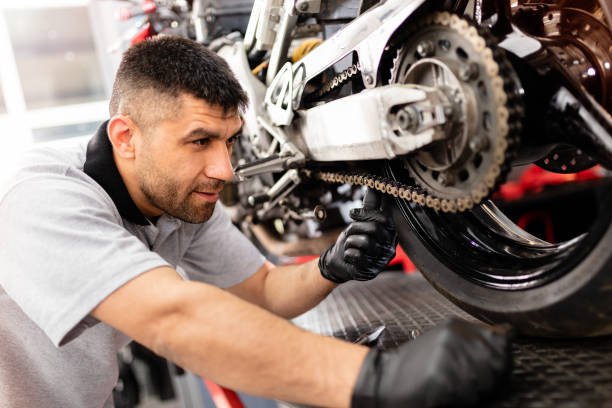 istock Motorbike Repairman 1223825532