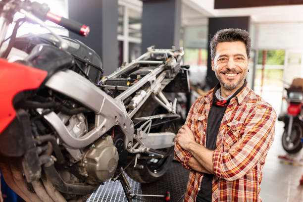istock Motorbike Repairman 1223825698