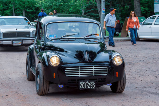 1959 Morris Minor 1000 coupe Moncton, New Brunswick, Canada - July 9, 2016 : 1959 Morris Minor 1000 coupe in Centennial Park during 2016 Atlantic Nationals Automotive Extravaganza. 1950 1959 stock pictures, royalty-free photos & images