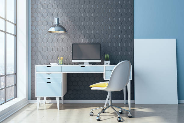 Minimalistic workplace in home office with blank poster