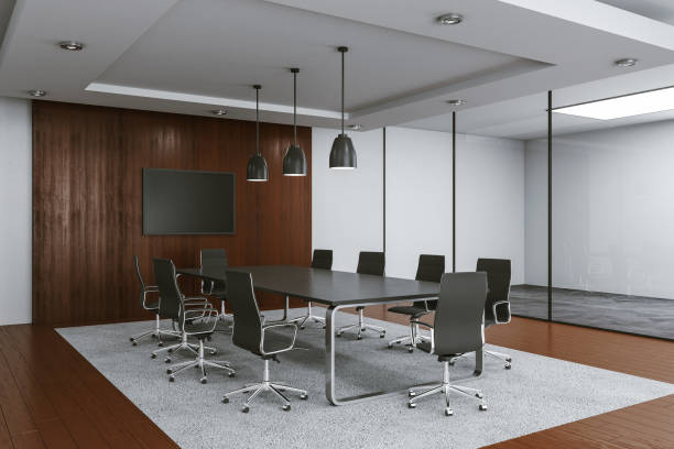 istock Modern conference room interior with blank tv screen. 1223835935
