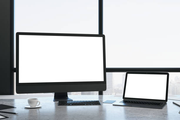 istock Coworking office room interior with computer and laptop 1223836004