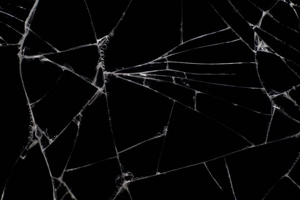 istock Broken black glass, with white lines on black glass. 1223841410