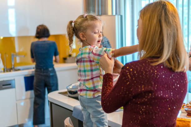 istock Happy mother and daughter in kitchen 1223842562
