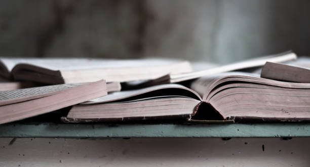old used books over an ancient table