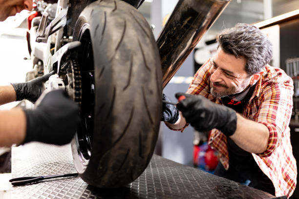 istock Motorbike Repairman 1223845378