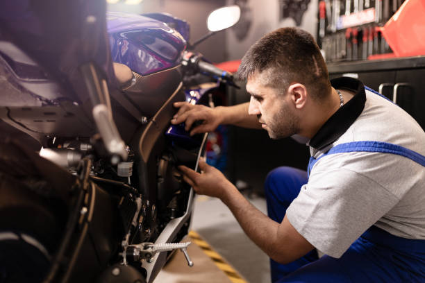 istock Motorbike Repairman 1223846381
