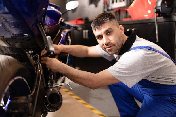istock Motorbike Repairman 1223847208