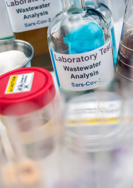 istock Wastewater samples, analysis of sars-cov-2 virus in patients infected by human coronavirus 229E, conceptual image 1223851011