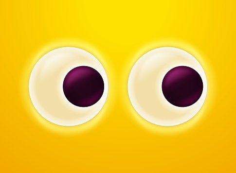 Yellow googly eyes looking to the side monster face.