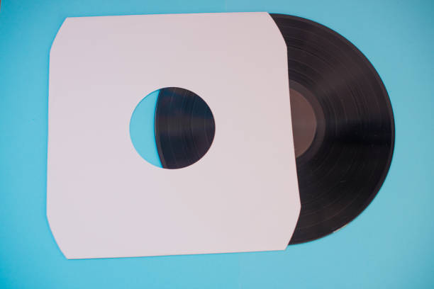 istock Vinyl record isolated against blue background 1223870073