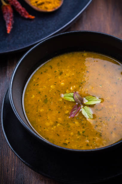 istock Red lentil curry soup with hot chilli and Thai basil 1223872691