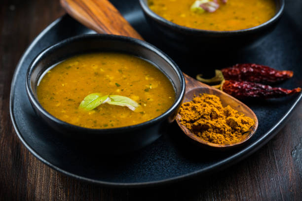 istock Red lentil curry soup with hot chilli and Thai basil 1223873290