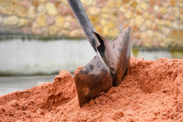 istock Pile Of Sand And Shovel For Construction. 1223875533