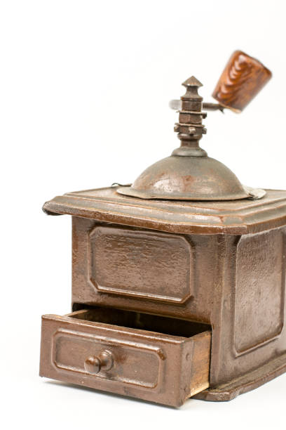 istock Wooden old hand mill over white background 1223877638