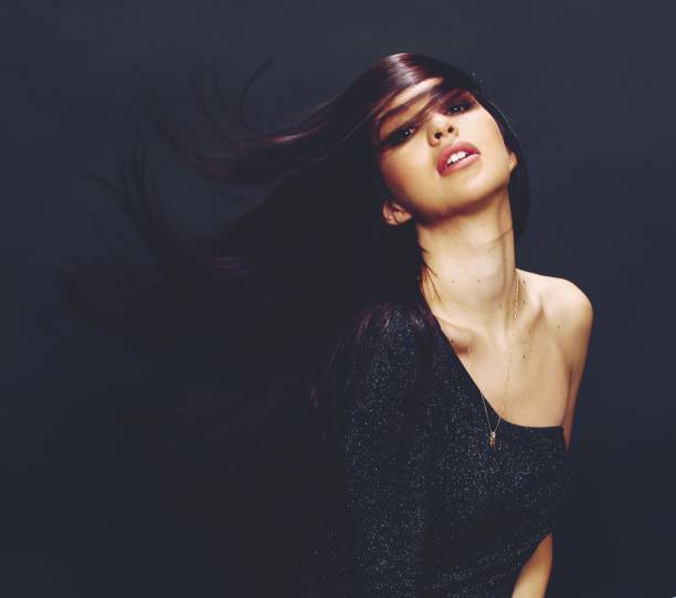 istock Beautiful, stylish brunette female model posing in studio on isolated background. 1223877824
