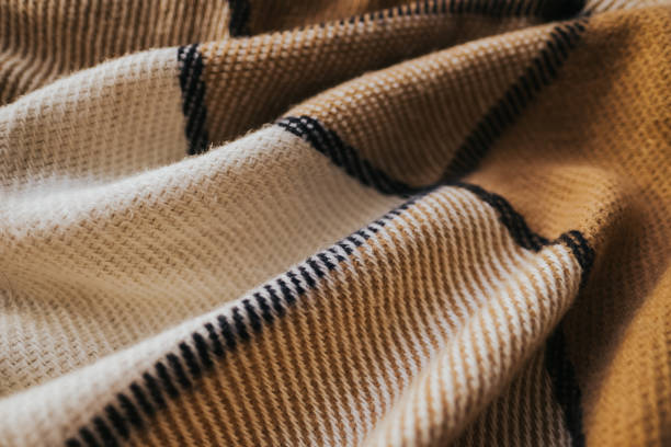 Background texture of warm checkered woolen plaid.