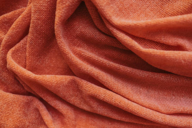 istock Background texture of warm orange plaid. 1223880616