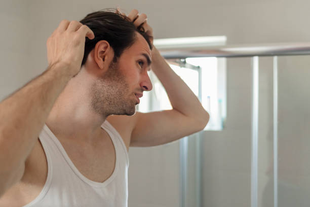 istock Worrying About Hair Loss 1223880831