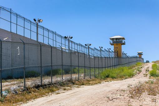 El Hongo, Baja California, Mexico, April 30 - A view of the enclosure wall and guard towers of the El Hongo II maximum security penitentiary in the state of Baja California, northern Mexico, near the city of Tecate and the border with the United States.