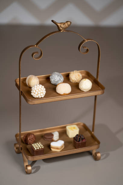 istock Homemade candy with chocolate , nuts and dried strawberry on a black table 1223885126