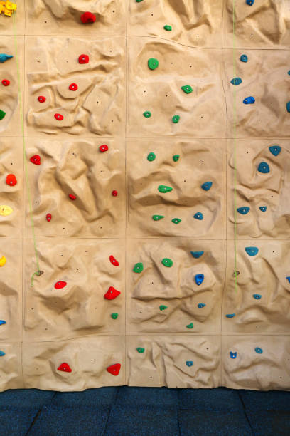 istock Indoor Rock Climbing wall with padded floor 1223886625
