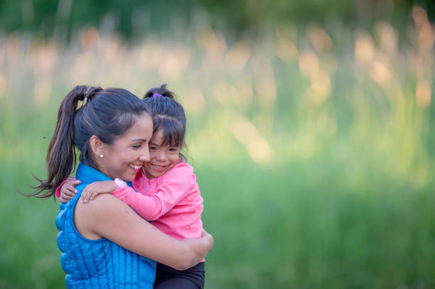 istock Hispanic mother and daughter enjoying nature 1223893967