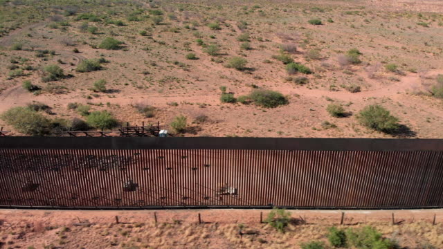 4K Drone Video of the International Wall between Mexico and the United States in New Mexico Where the Wall is Under Construction.