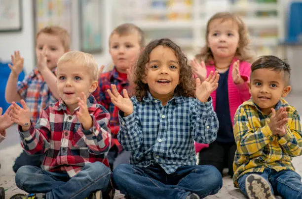 Group of preschool aged children together at school.