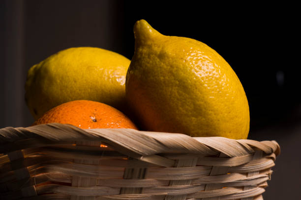 istock A wooden basket with oranges and lemons 1223897950
