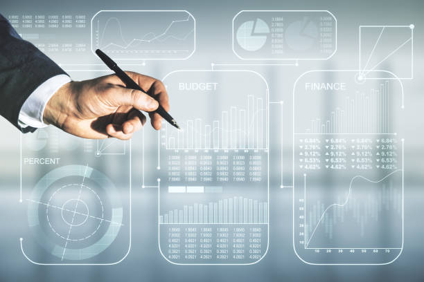istock Double exposure of male hand with pen working with abstract virtual statistics data hologram on blurred office background, statistics and analytics concept 1223903166
