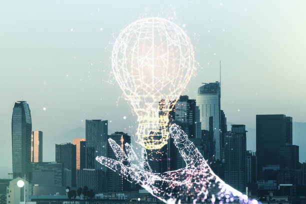 istock Abstract virtual light bulb hologram on Los Angeles office buildings background, idea concept. Multiexposure 1223903293