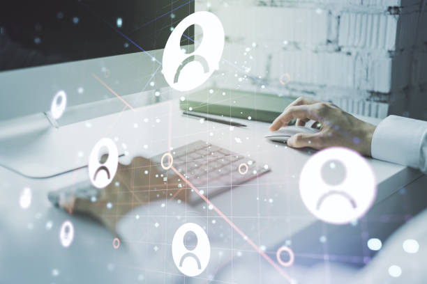 istock Double exposure of social network icons concept with hand typing on computer keyboard on background. Networking concept 1223903866