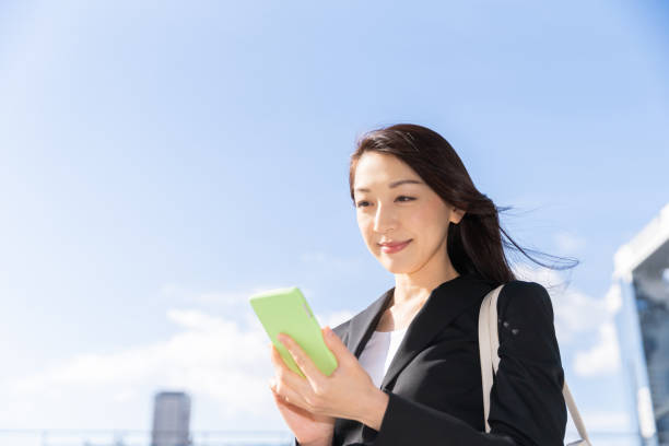 istock asian woman who see a smart phone 1223903871