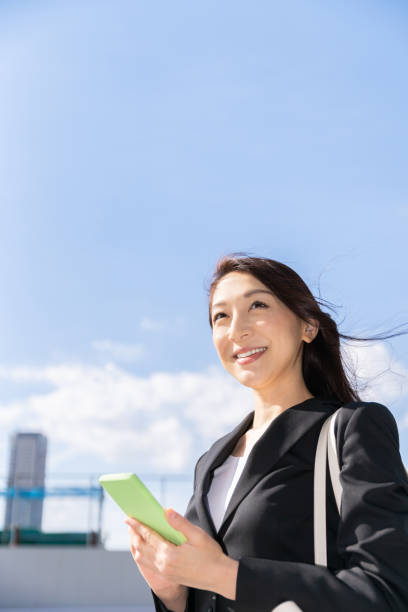 istock asian woman who see a smart phone 1223903904