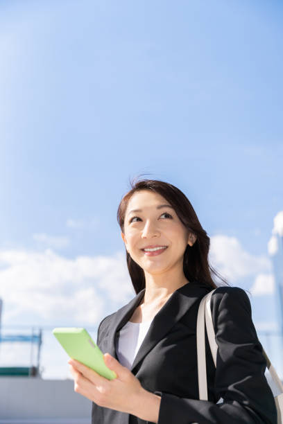 istock asian woman who see a smart phone 1223903929