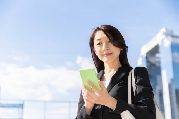istock asian woman who see a smart phone 1223903936