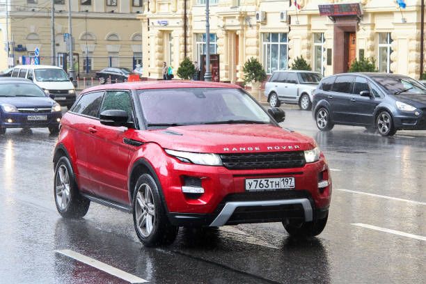 Range Rover Evoque Moscow, Russia - June 3, 2012: Red crossover Range Rover Evoque in the city street. evoque stock pictures, royalty-free photos & images