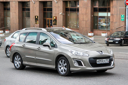 Moscow, Russia - June 2, 2013: Estate car Peugeot 308SW in the city street.