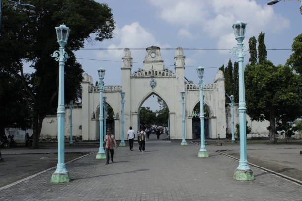 Gate of Great Mosque of Surakarta Sutanate Palace under cloudy blue sky Gate of Great Mosque of Surakarta Palace under cloudy blue sky. The Great Mosque of the Surakarta Palace was built by Sunan Pakubuwono III in 1763 and was completed in 1768. The mosque is located in complex of Surakarta Sutanate Palace, Surakarta, Indonesia. central java province photos stock pictures, royalty-free photos & images