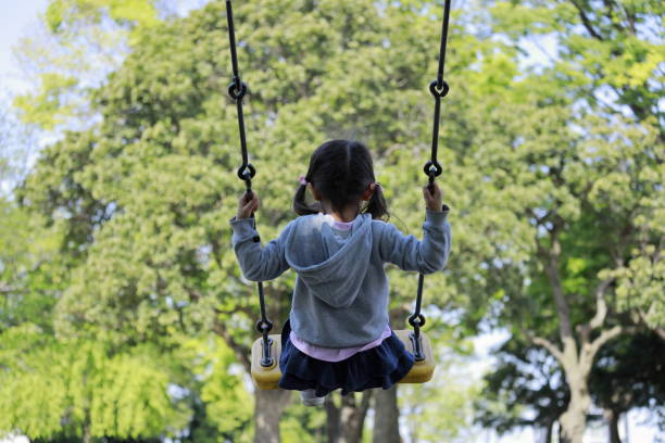 istock Japanese girl on the swing (appearance from behind) (5 years old) 1223908764