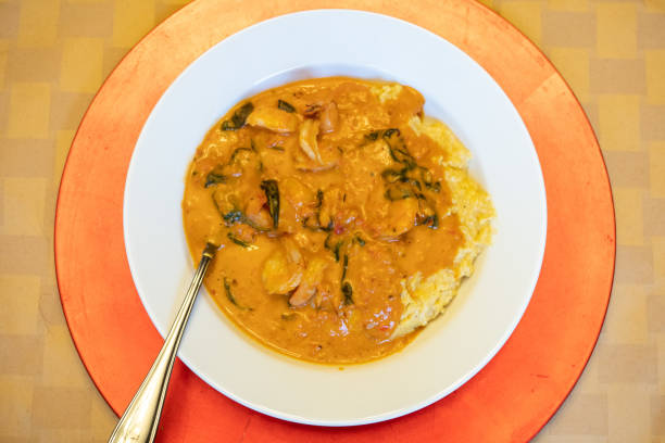 Shrimp and Grits in a Tomato Based Sauce