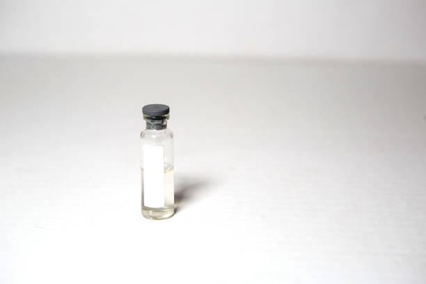 istock A medical bottle with a place to sign it. Ampoule on a white background, isolate, space for text. Pharmaceutical and chemical laboratory concept 1223914476