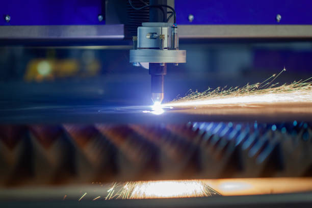 istock cnc plasma cutting machine cuts metal sheet. Sparks fly 1223915937