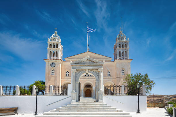 Agia Triada Monastery, dedicated to the Holy Trinity, the Church in the Mountain Village of Lefkes under blue summer skyscape. Byzantine Church Architecture from the year 1830. Agia Triada Monastery, Lefkes, Paros Island, Cyclades Islands, Greece, Europe