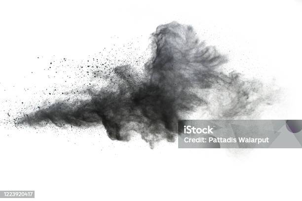 Black Powder Explosionthe Particles Of Charcoal Splash On White Background Stock Photo - Download Image Now